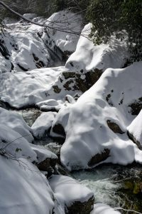Snow on Sunburst Falls